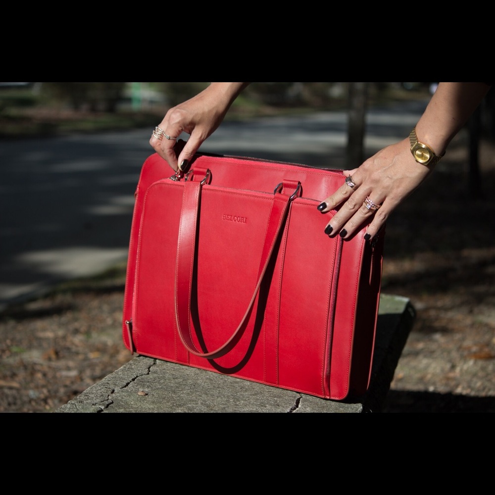 I absolutely love it but I have a similar bag.